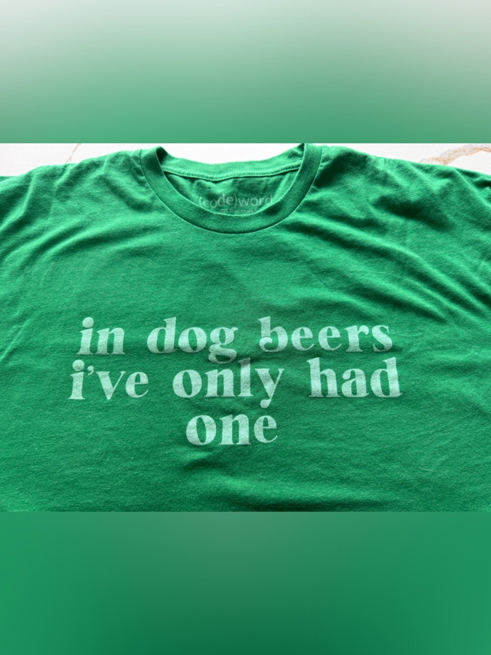 Green Graphic Short Sleeve Tee with White Slogan